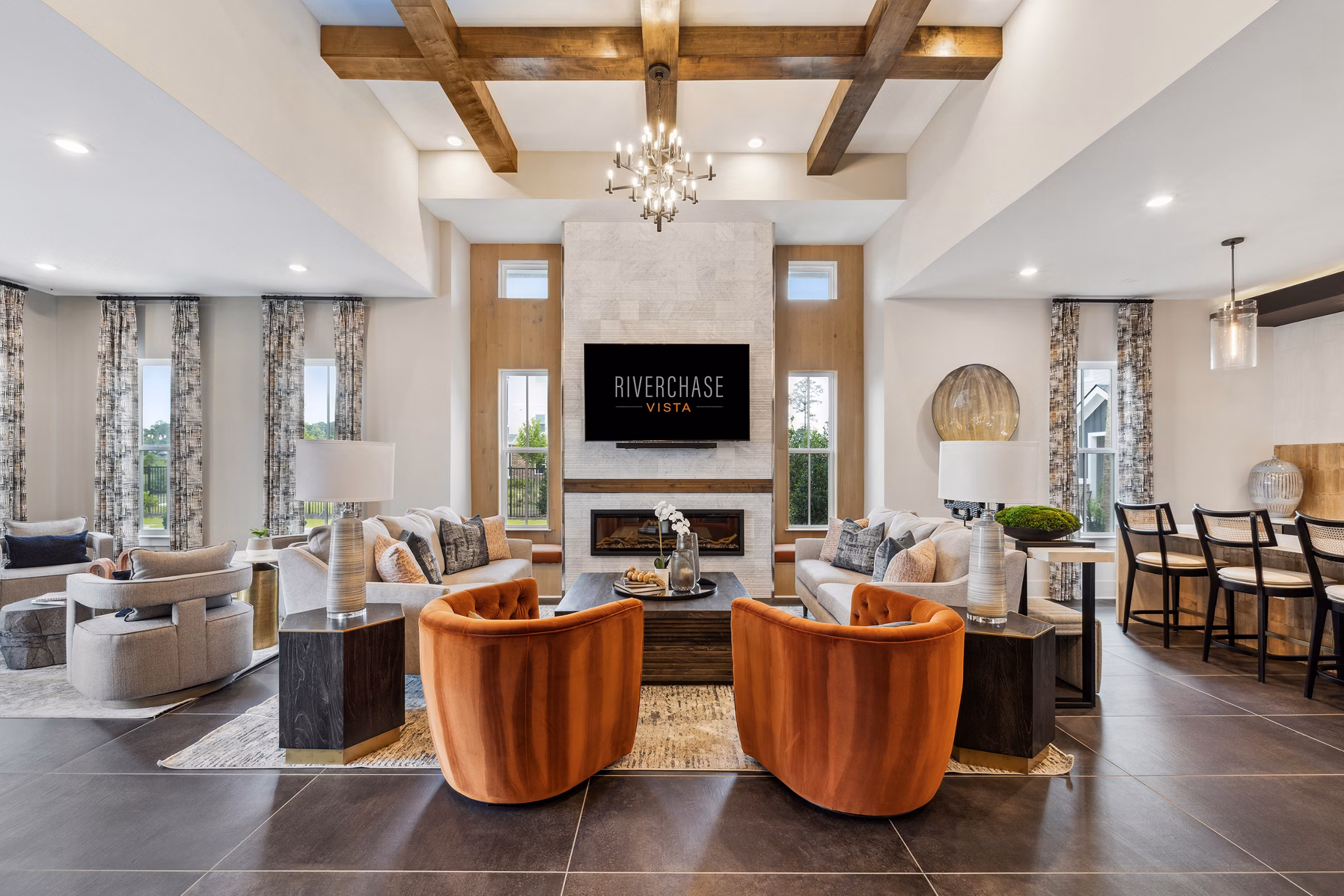 Clubhouse featuring modern design and lounge area at Riverchase Vista Apartments