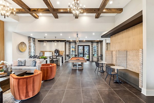 Clubhouse featuring modern decor and lounge areas at Riverchase Vista Apartments