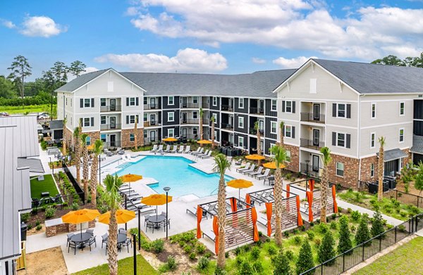 Riverchase Vista Apartments: Scenic river view from modern balcony, luxury living near downtown