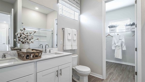Bathroom with modern fixtures at Yardly Artisan Lakes Homes