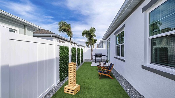 Patio with stylish outdoor furniture at Yardly Artisan Lakes Homes luxury apartments