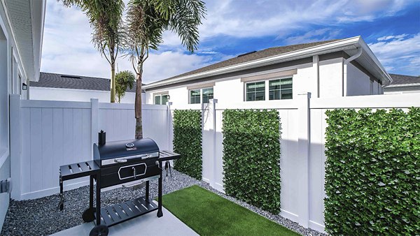 Patio with outdoor seating at Yardly Artisan Lakes Homes luxury apartments