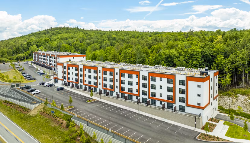 The Marek South: Contemporary luxury apartment building in vibrant cityscape