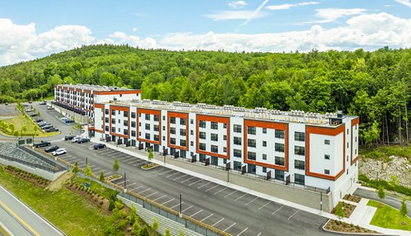 The Marek South: Contemporary luxury apartment building in vibrant cityscape