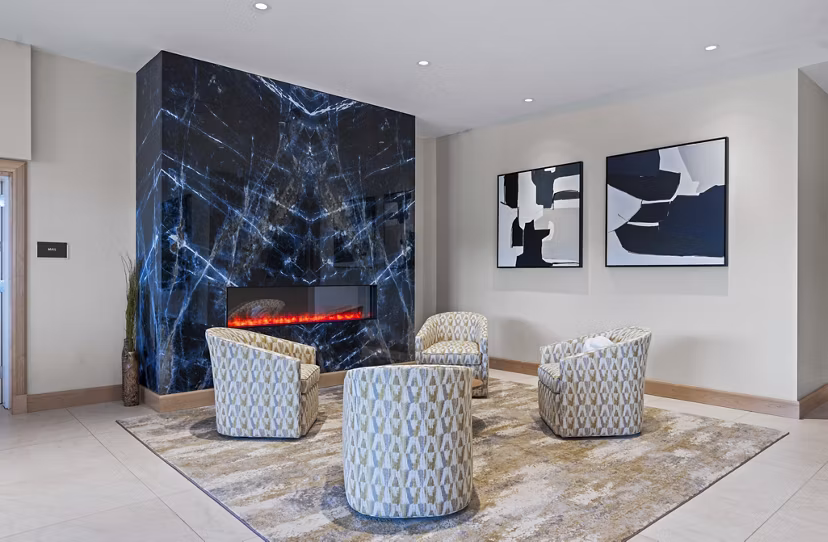 Clubhouse with modern decor and lounging areas at The Marek South Apartments