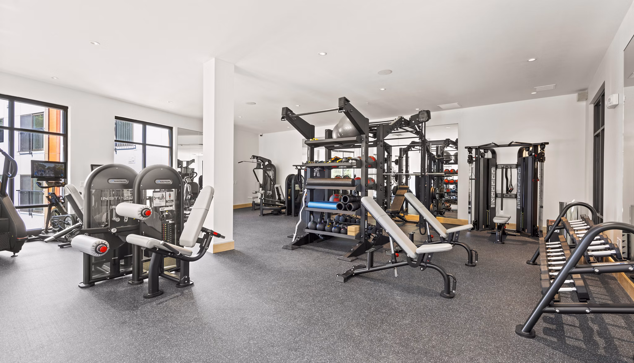 Fitness center with modern equipment at The Marek South Apartments