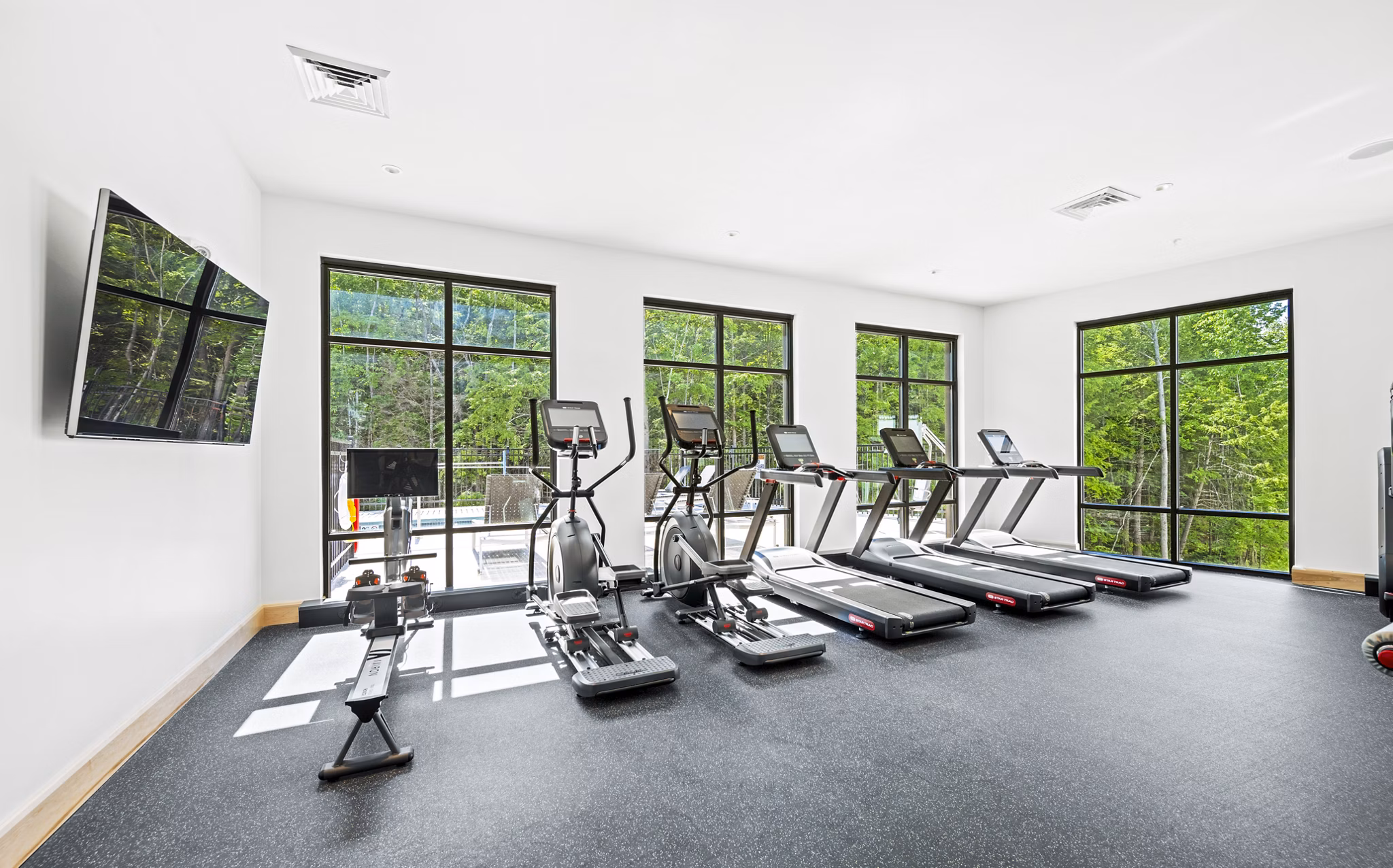 Well-equipped fitness center with modern gym facilities at The Marek South Apartments, perfect for an active lifestyle