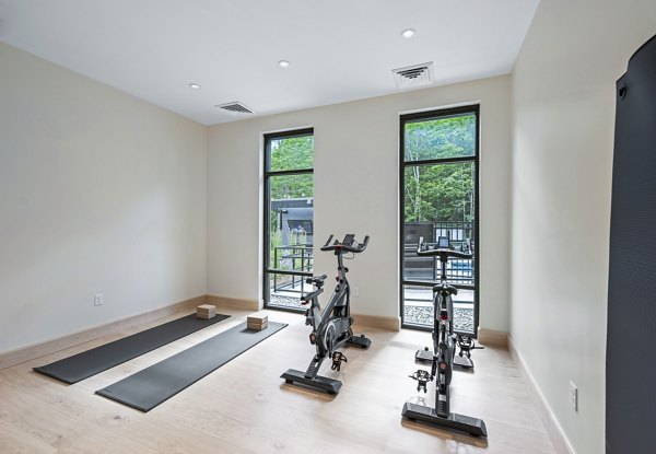 Yoga and spin studio with modern equipment at The Marek South Apartments