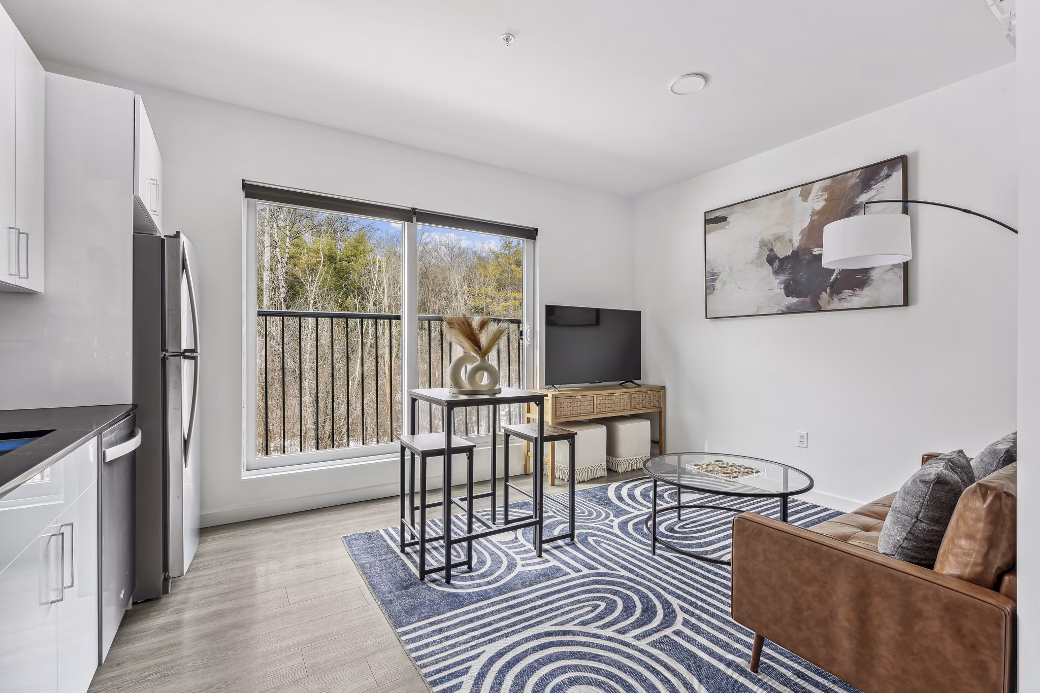 Spacious kitchen with modern appliances and granite countertops at The Marek South Apartments luxury homes