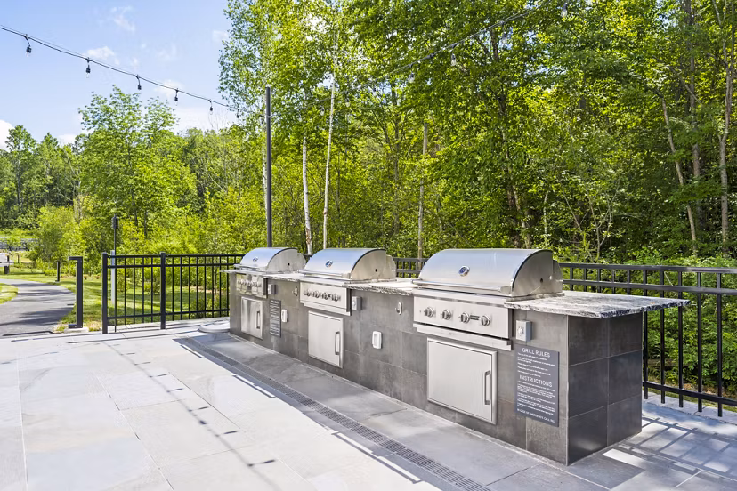 The Marek South Apartments: Cozy fire pit area on expansive outdoor patio