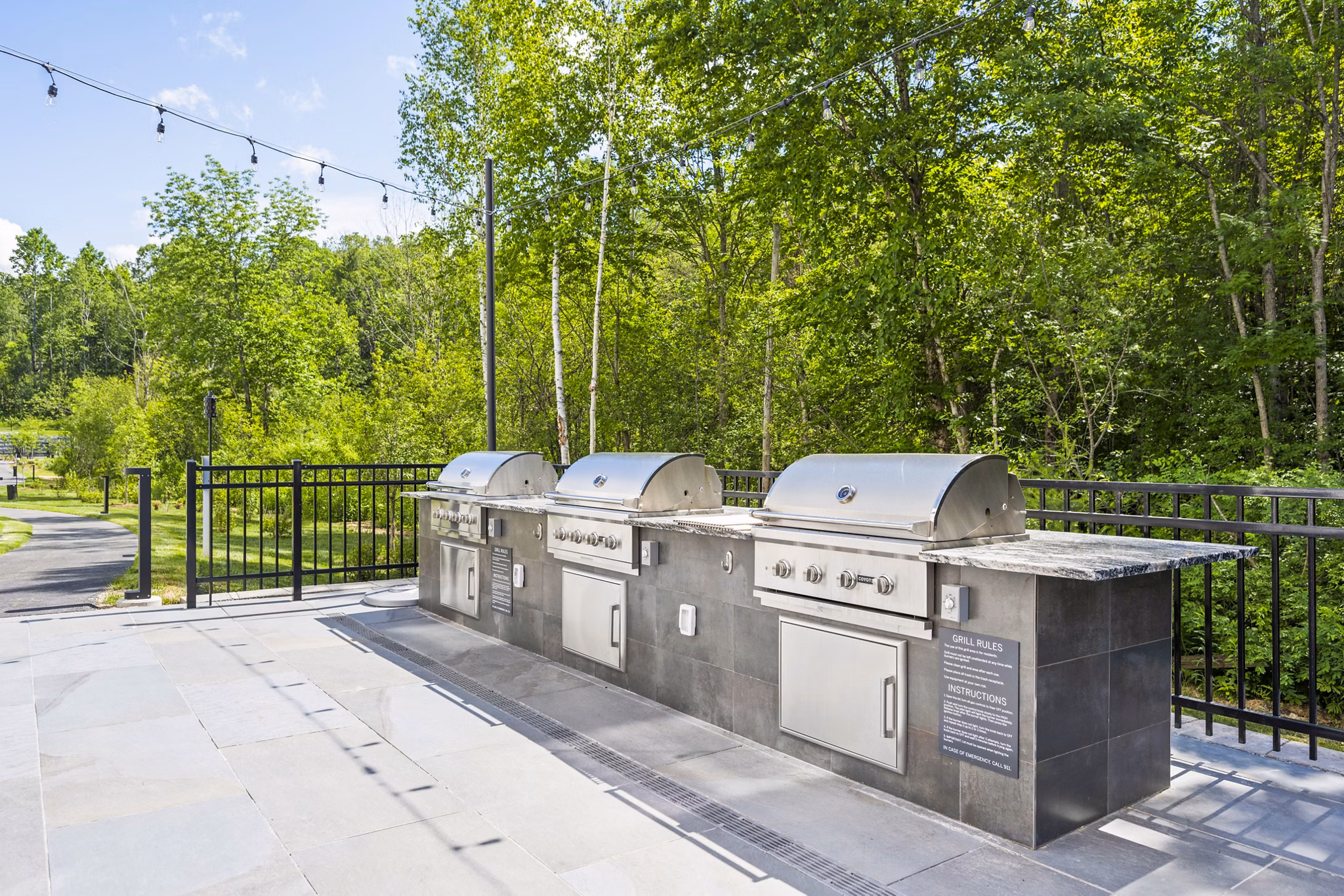 The Marek South Apartments: Cozy fire pit area on expansive outdoor patio