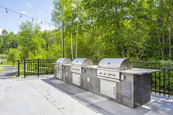 The Marek South Apartments: Cozy fire pit area on expansive outdoor patio