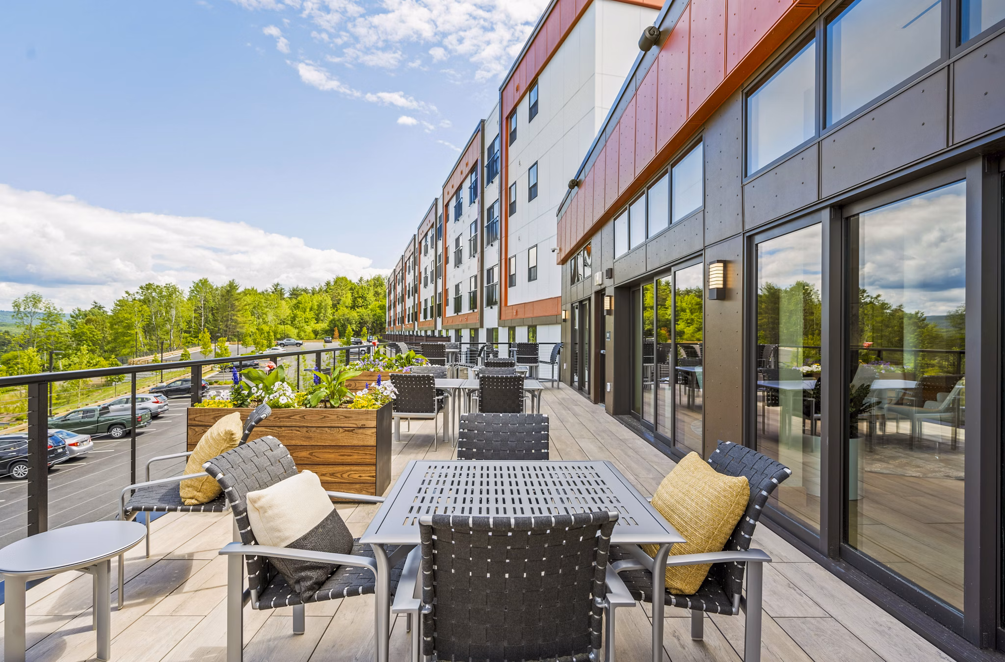 Cozy fire pit patio at The Marek South Apartments in luxury setting
