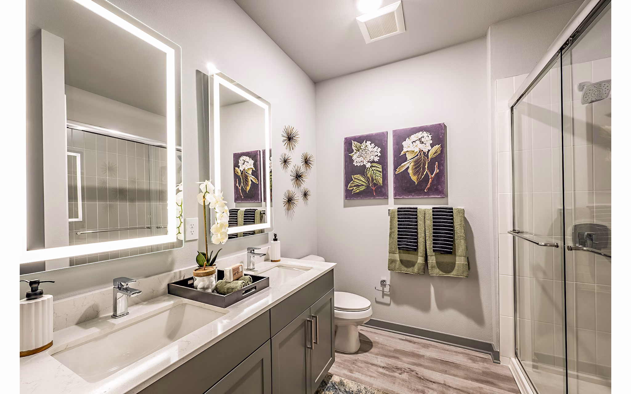 Modern bathroom with sleek fixtures at The Aston at Town Center Apartments, featuring luxury finishes and spacious layout