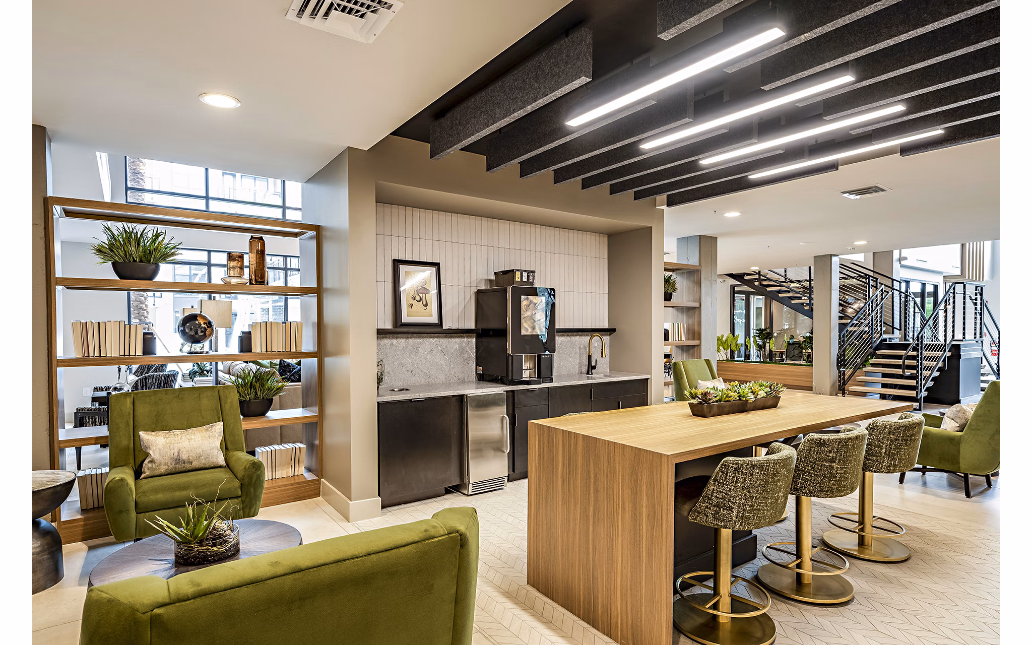 Clubhouse with modern design and seating areas at The Aston at Town Center Apartments, offering luxury amenities for residents