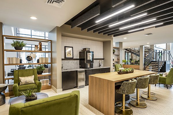 Clubhouse with modern design and seating areas at The Aston at Town Center Apartments, offering luxury amenities for residents