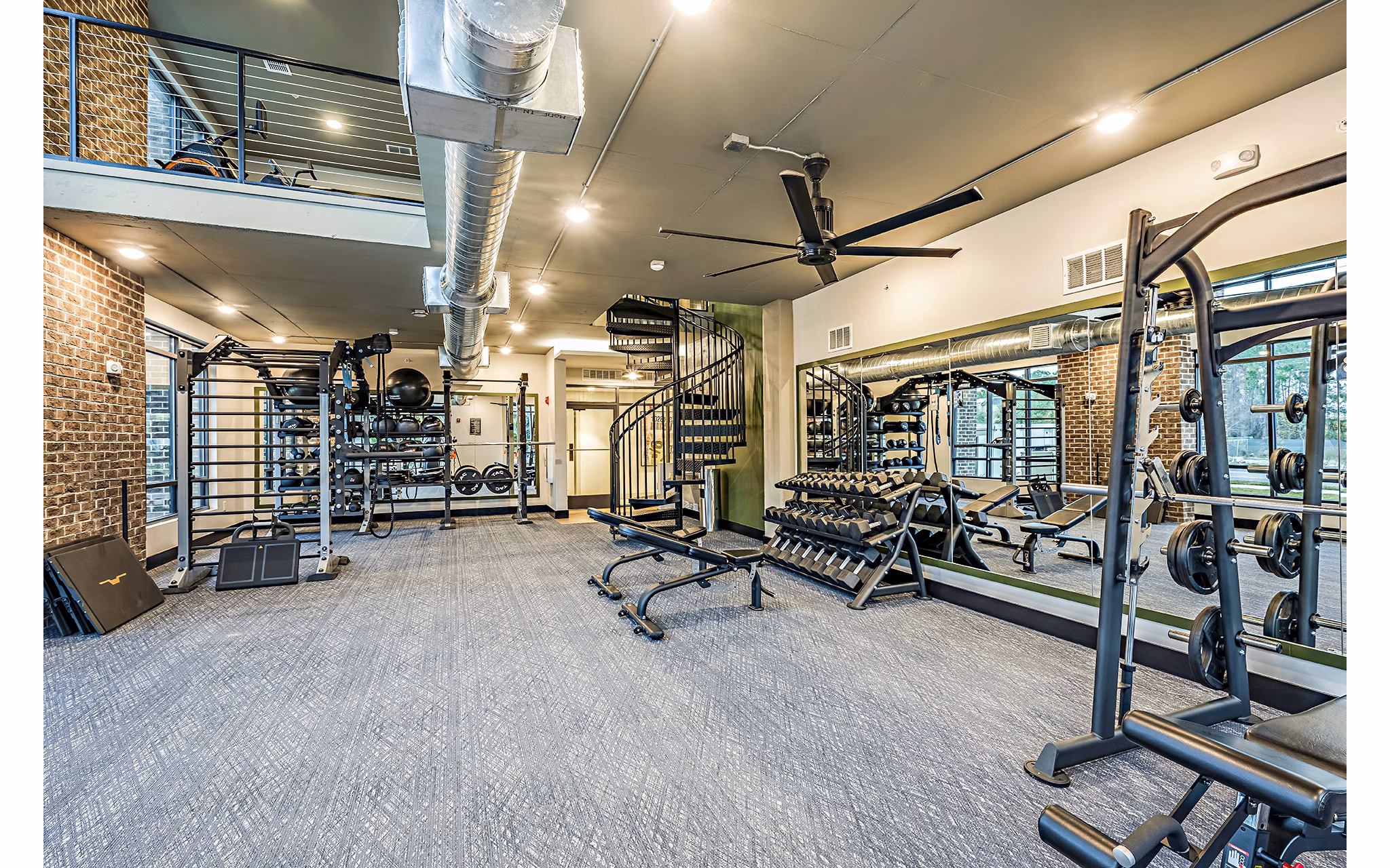 State-of-the-art fitness center with modern equipment at The Aston at Town Center Apartments