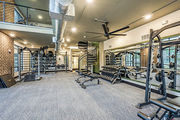 State-of-the-art fitness center with modern equipment at The Aston at Town Center Apartments