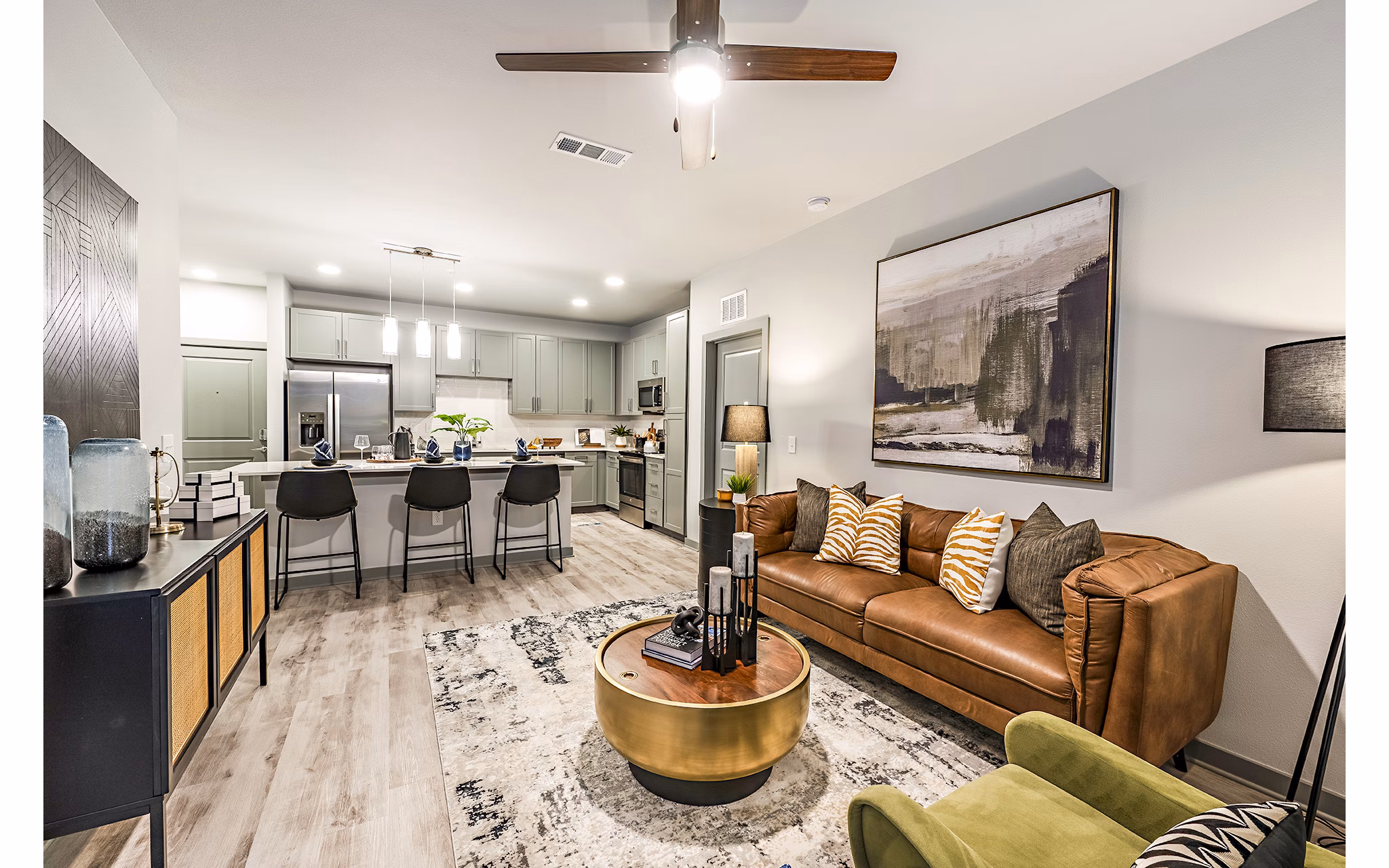 Modern living room with sleek furnishings at The Aston at Town Center Apartments, offering luxury living in the heart of a vibrant community