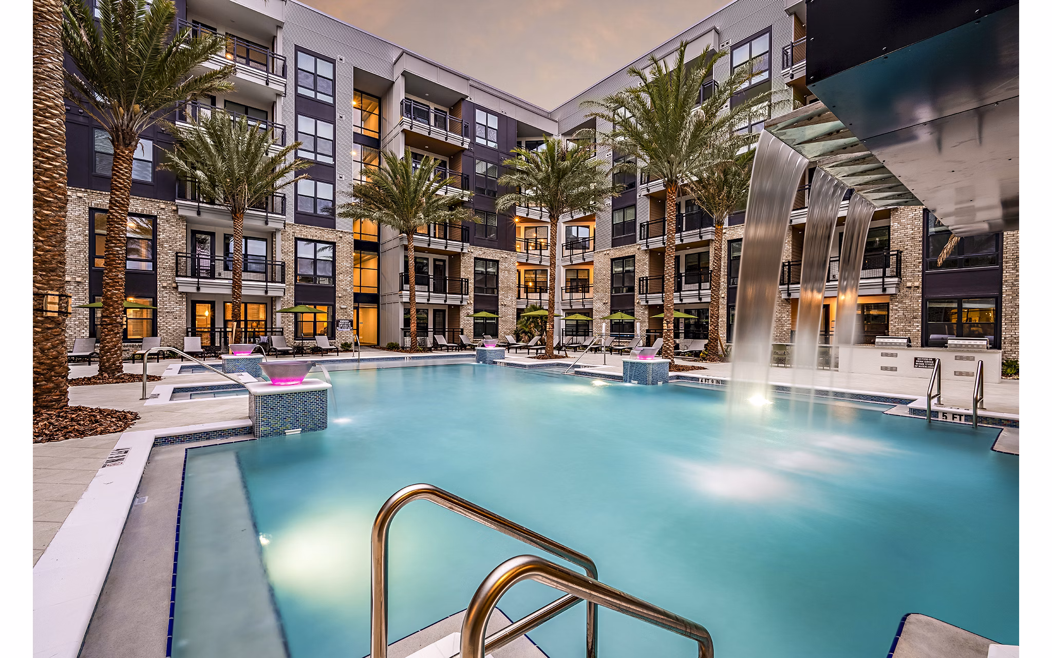 Resort-style pool at The Aston at Town Center Apartments, perfect for relaxation and leisure activities