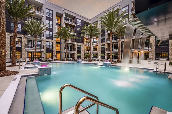 Resort-style pool at The Aston at Town Center Apartments, perfect for relaxation and leisure activities