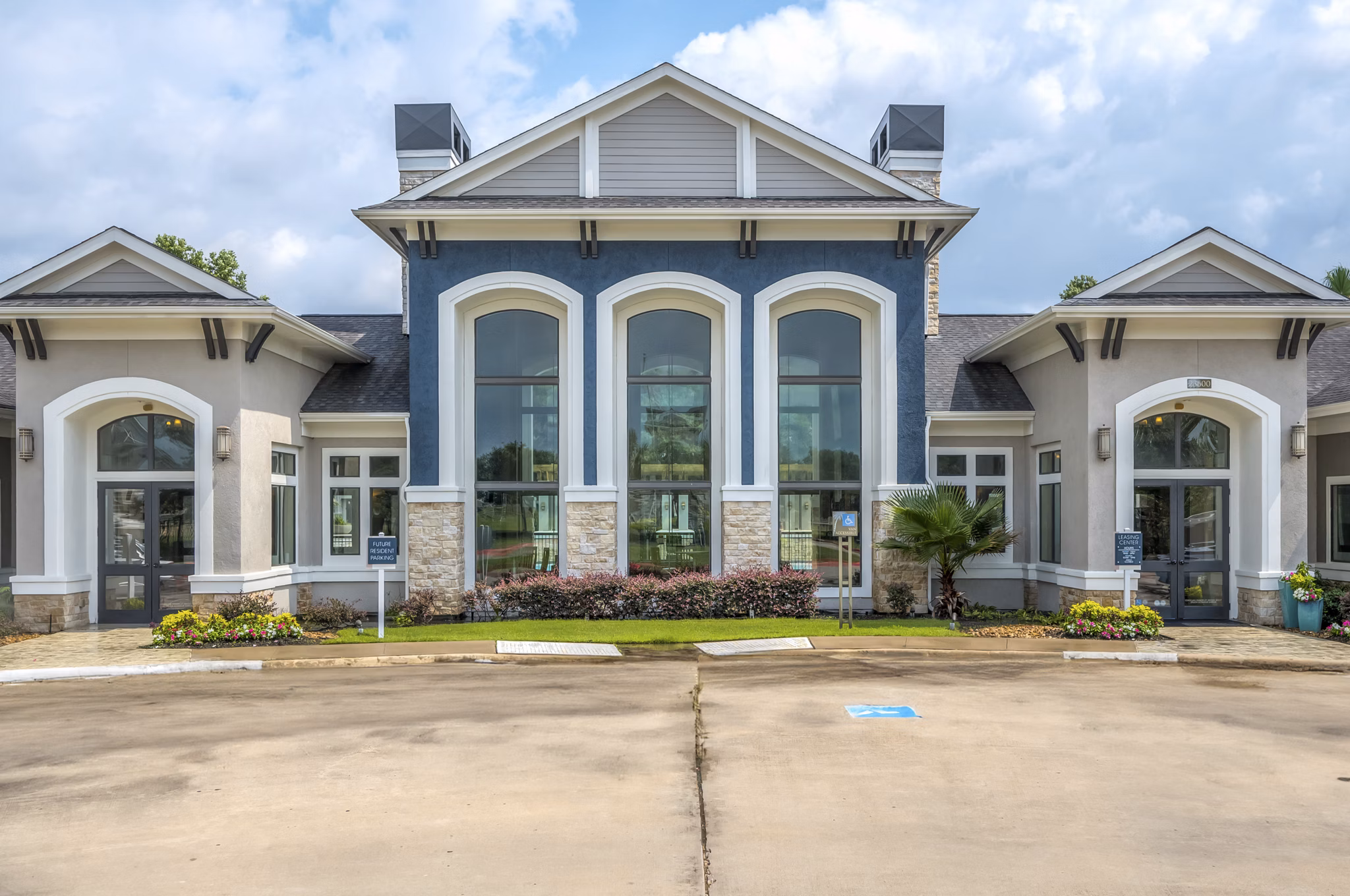 building/exterior at Palms at Cinco Ranch Apartments