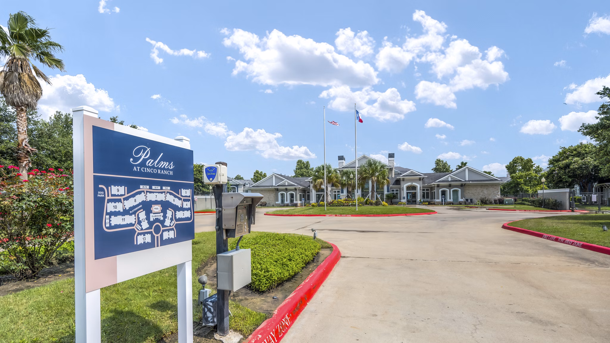 building/exterior at Palms at Cinco Ranch Apartments