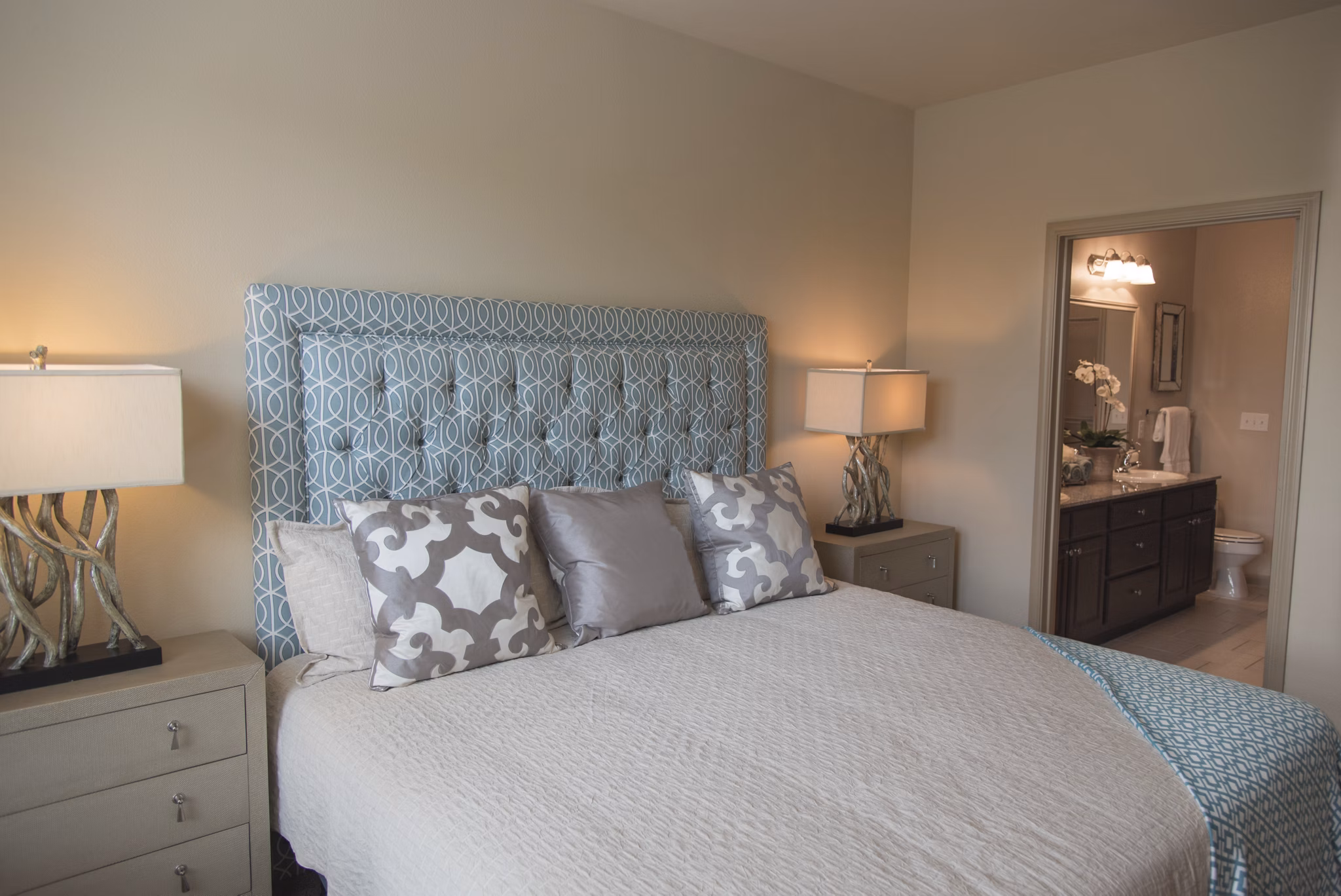 Cozy bedroom with stylish decor in Palms at Cinco Ranch Apartments