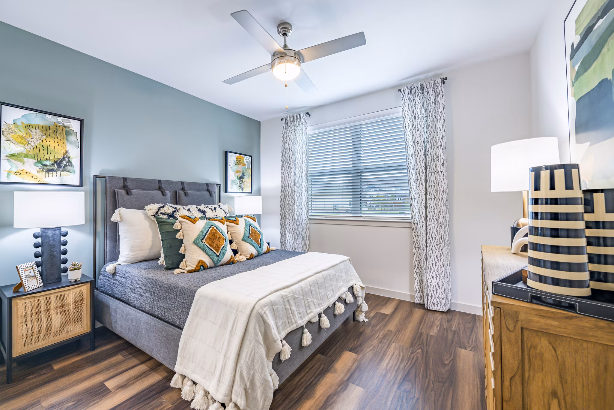Cozy bedroom with contemporary decor at Prose Stoneridge Apartments
