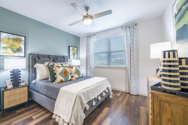 Cozy bedroom with contemporary decor at Prose Stoneridge Apartments