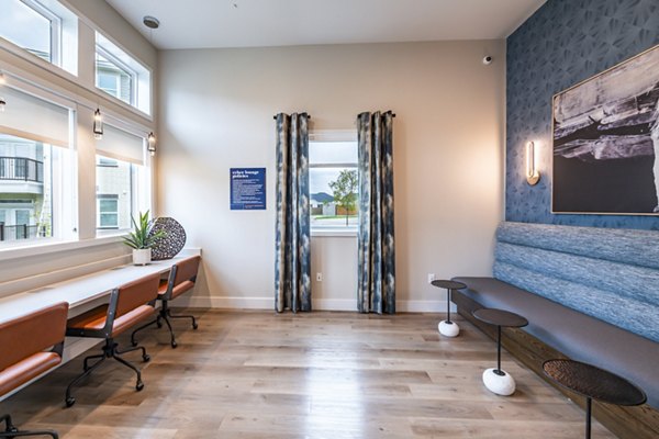 Clubhouse business center with modern workstations at Prose Stoneridge Apartments, ideal for remote work and meetings