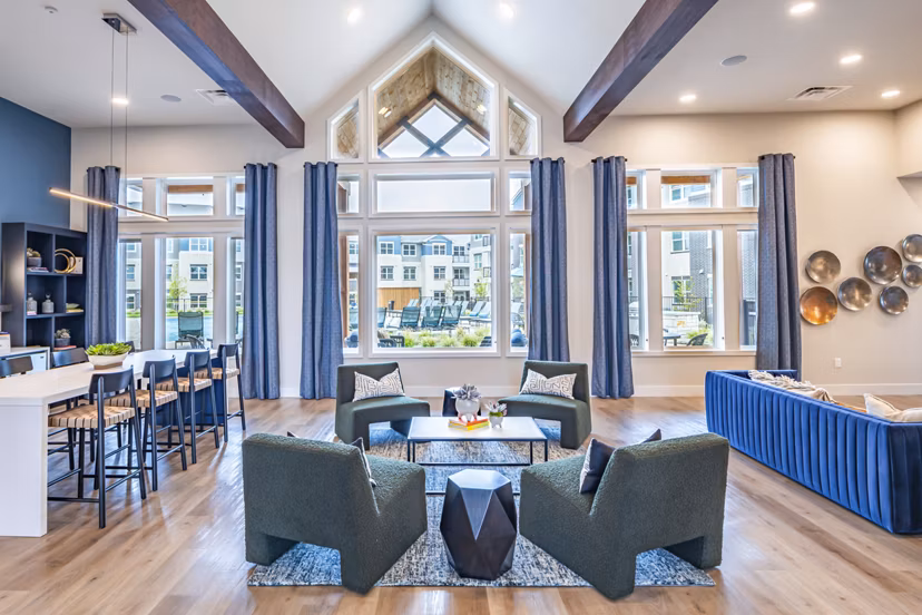 Clubhouse featuring modern design and vibrant decor at Prose Stoneridge Apartments luxury community