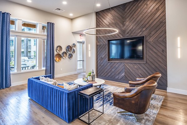 Elegant clubhouse with comfortable seating and modern decor at Prose Stoneridge Apartments