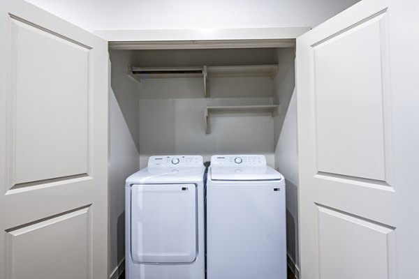 laundry room at Prose Stoneridge Apartments