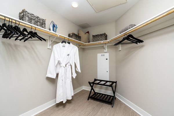Avenida Palm Desert Apartments: Walk-in closet with custom shelving in luxury apartment community