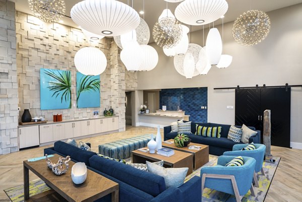 Avenida Palm Desert: Stylish clubhouse with vibrant decor in luxury apartments community