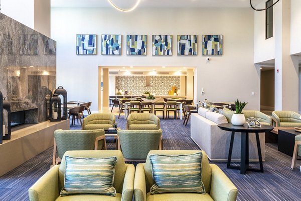 Clubhouse with modern furnishings and spacious design at Avenida Palm Desert Apartments