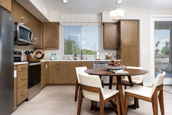 Dining area featuring modern furnishings in Avenida Palm Desert Apartments