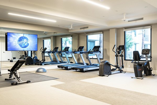 fitness center at Avenida Palm Desert Apartments 