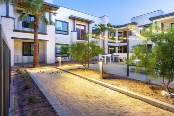 Sport court at Avenida Palm Desert Apartments: Tennis and basketball facilities in luxury apartment community