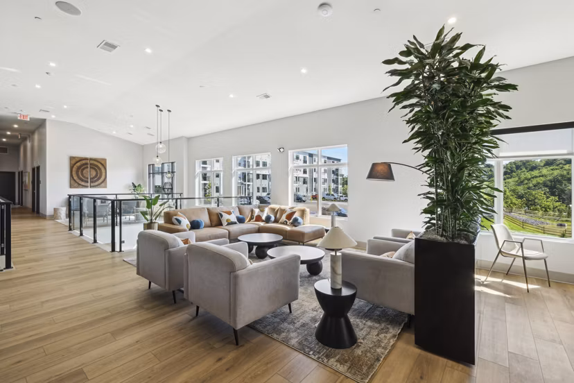 Clubhouse featuring sleek design and modern furnishings at The Foundmore Apartments