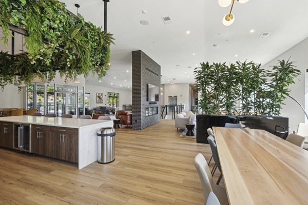 Clubhouse featuring modern seating and vibrant decor at The Foundmore Apartments