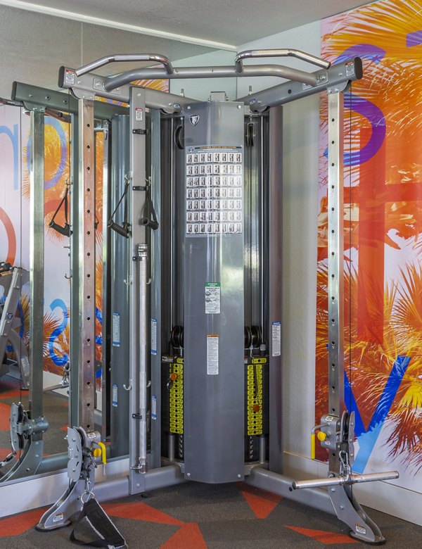 State-of-the-art fitness center featuring modern equipment at The Julia Apartments luxury community