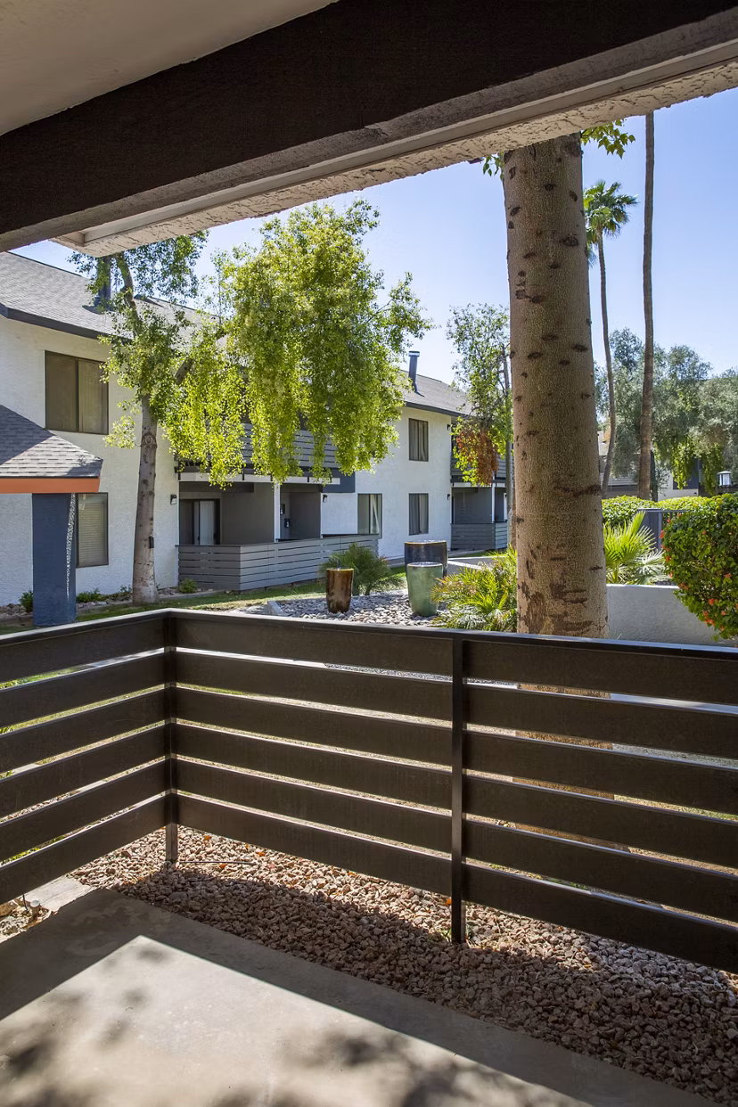 Patio with contemporary outdoor seating at The Julia Apartments, a luxury community offering views and relaxation spaces