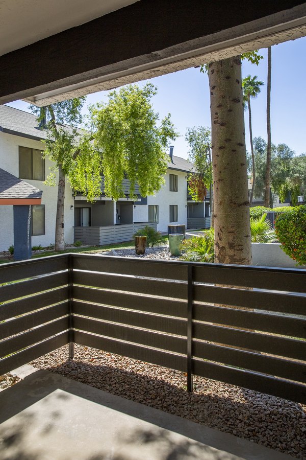 Patio with contemporary outdoor seating at The Julia Apartments, a luxury community offering views and relaxation spaces