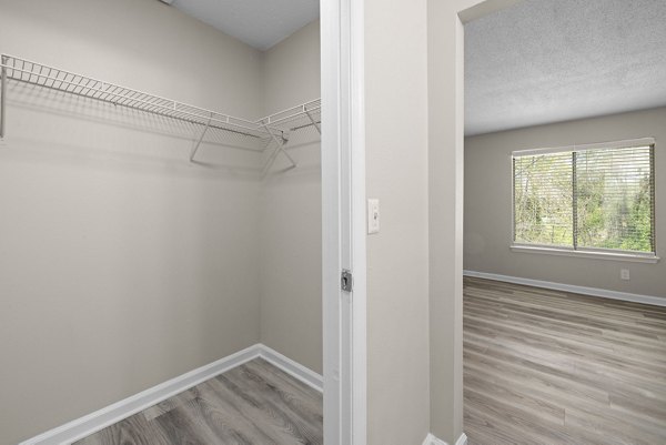 Walk-in closet with ample shelving in Madison at Adams Farm Apartments