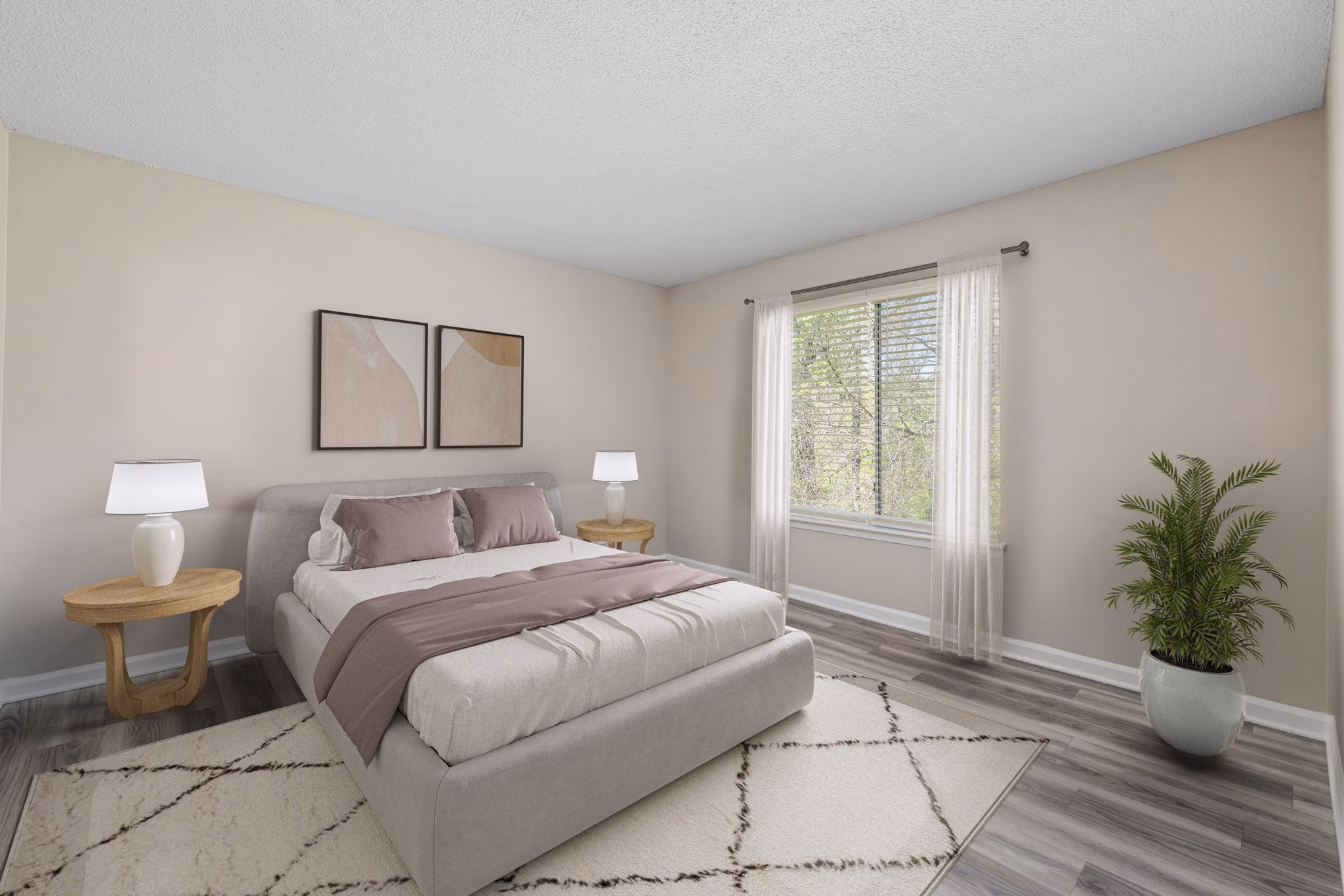 Cozy bedroom with modern decor at Madison at Adams Farm Apartments
