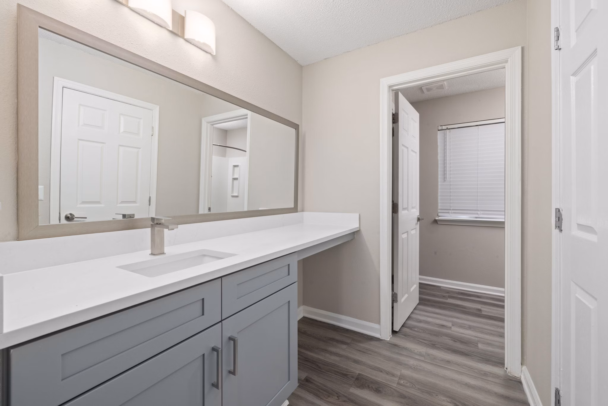 Bathroom featuring sleek fixtures and modern design at Madison at Adams Farm Apartments