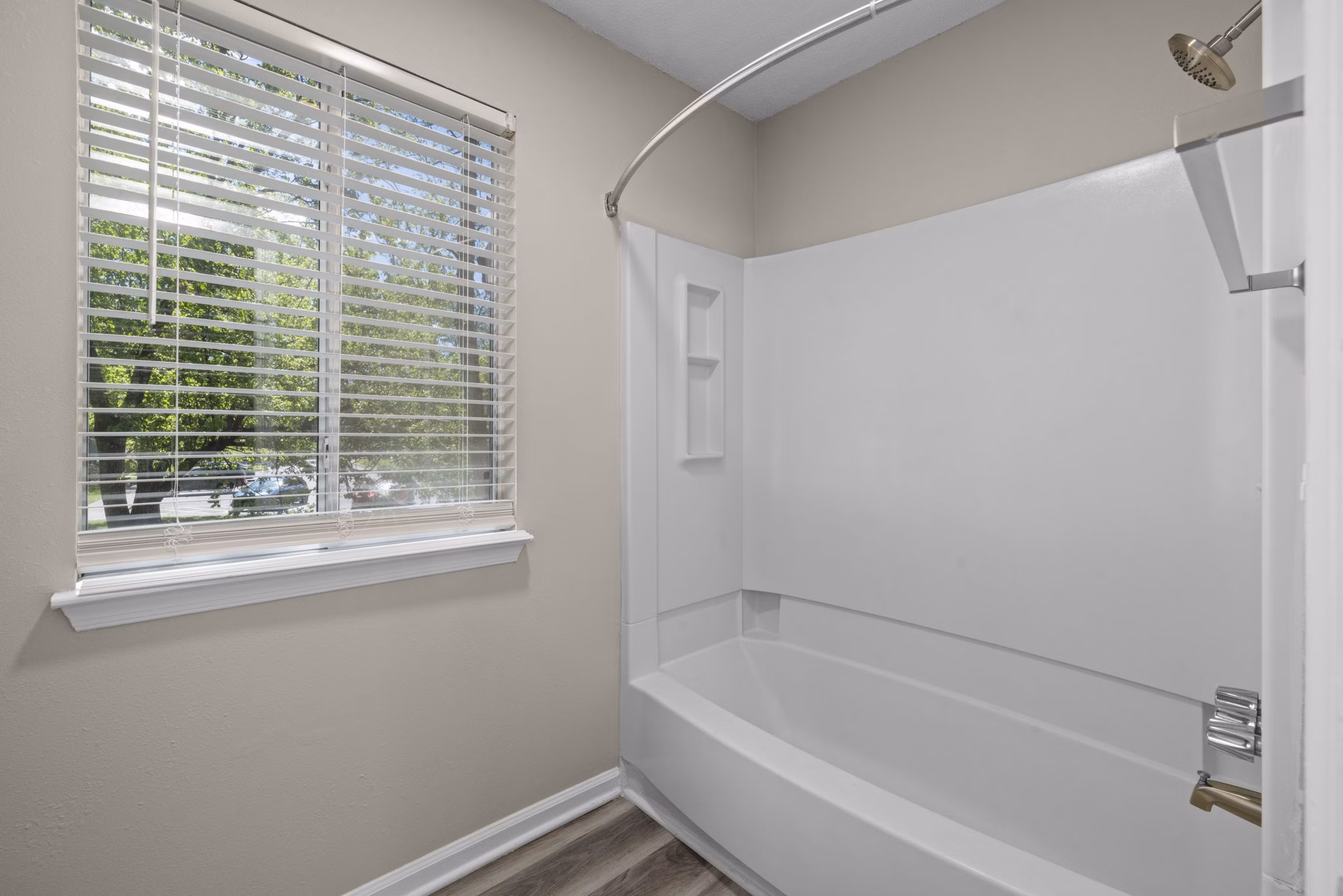 Elegant bathroom with modern fixtures at Madison at Adams Farm Apartments in Greensboro