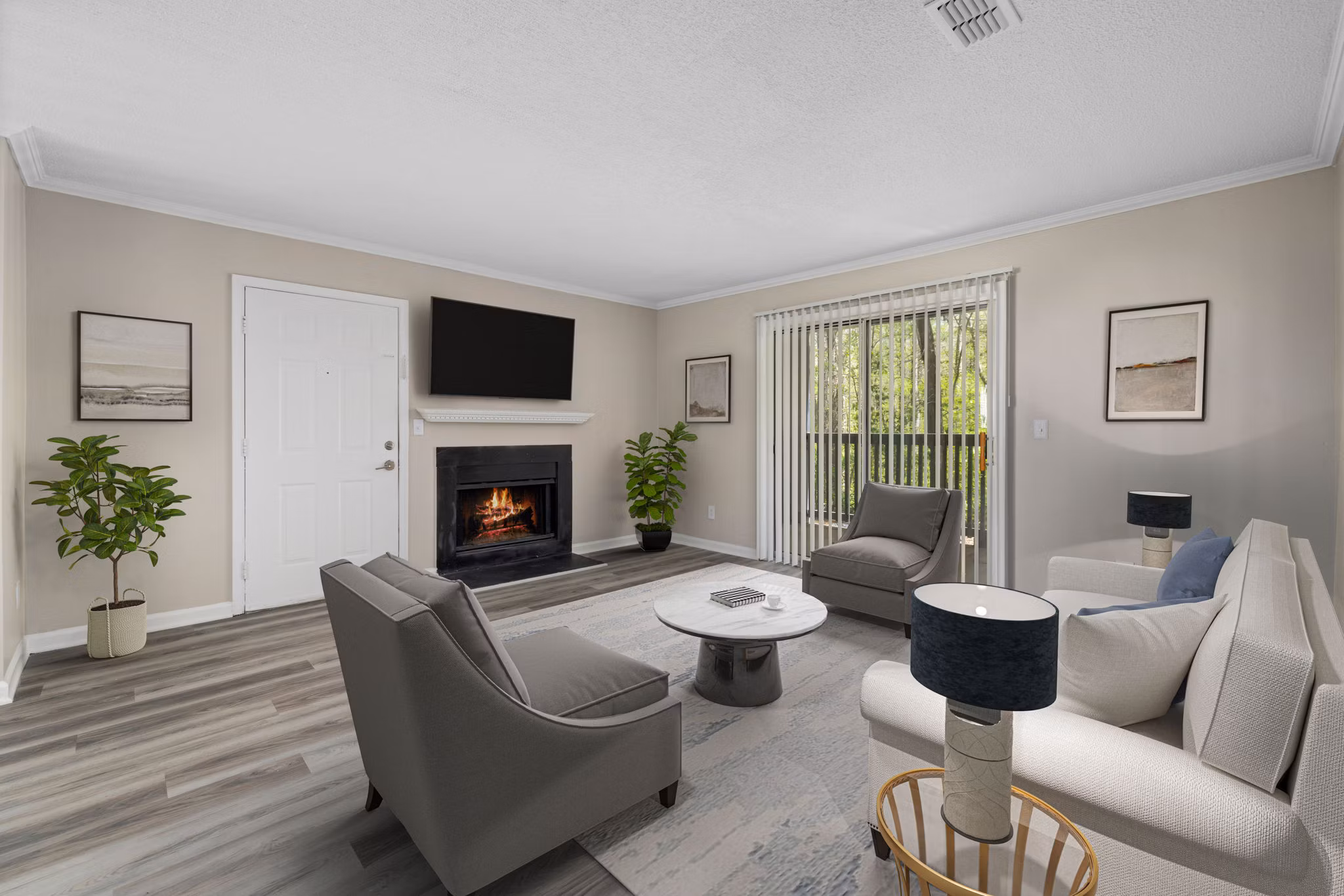 Open-concept living room with modern dÃ©cor at Madison at Adams Farm Apartments, part of Greystar's luxury apartment offerings